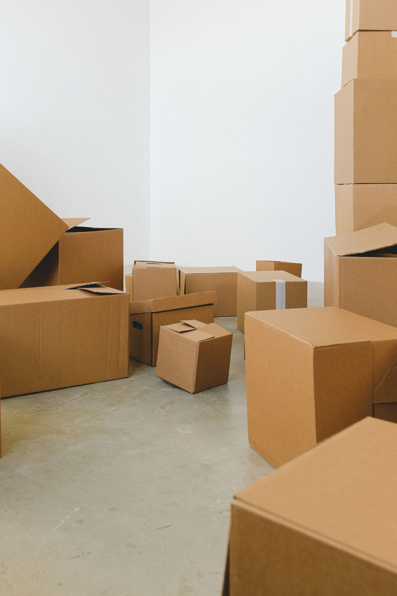 Moving boxes stacked in a Clermont FL home