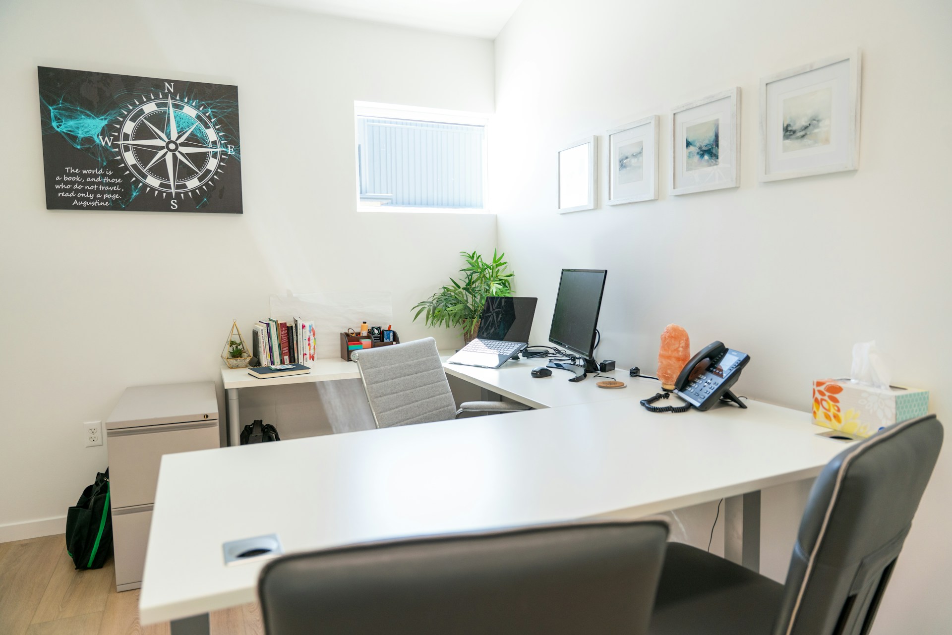 A clean, modern small office desk and workspace, illustrating a well-maintained office in Clermont, FL